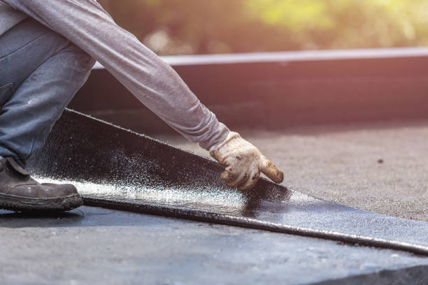 Professional Basement Waterproofing technician working in Ida, MI
